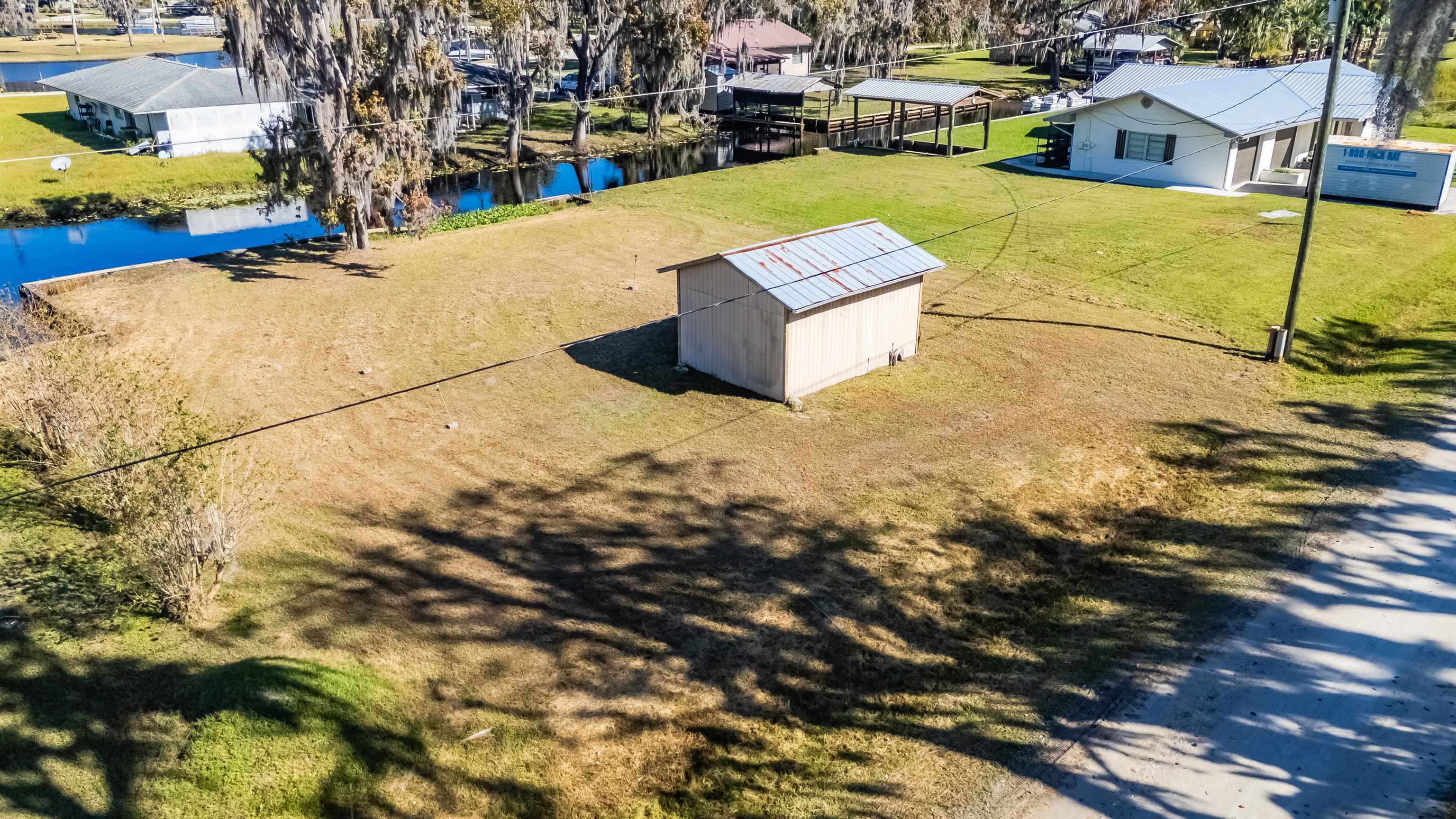 142 Hick's Avenue Crescent City, FL 32112 - Photo 3 of 16 a view of the terrace of a house