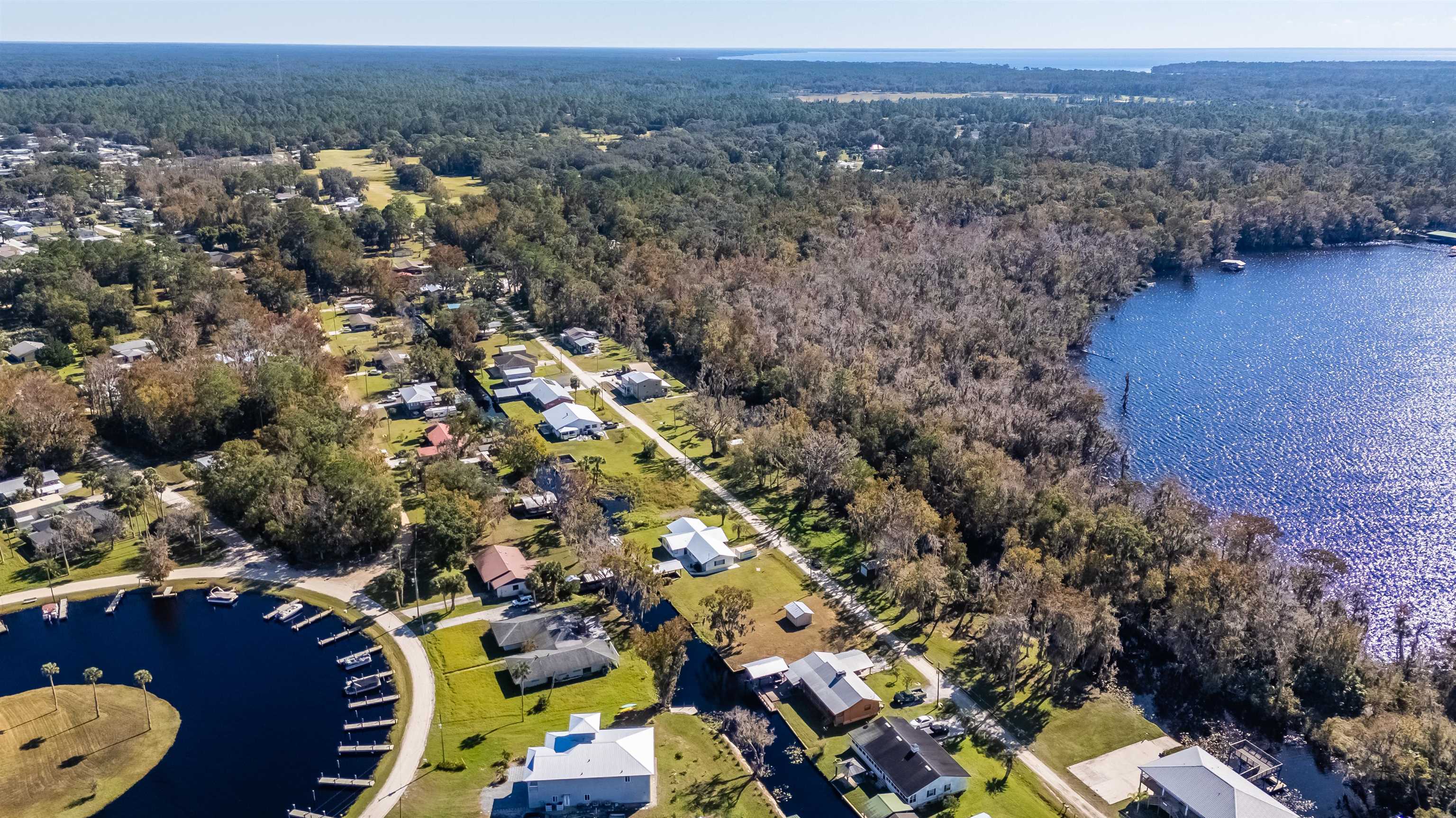 142 Hick's Avenue Crescent City, FL 32112 - Photo 5 of 16 an aerial view of a residential houses and outdoor space