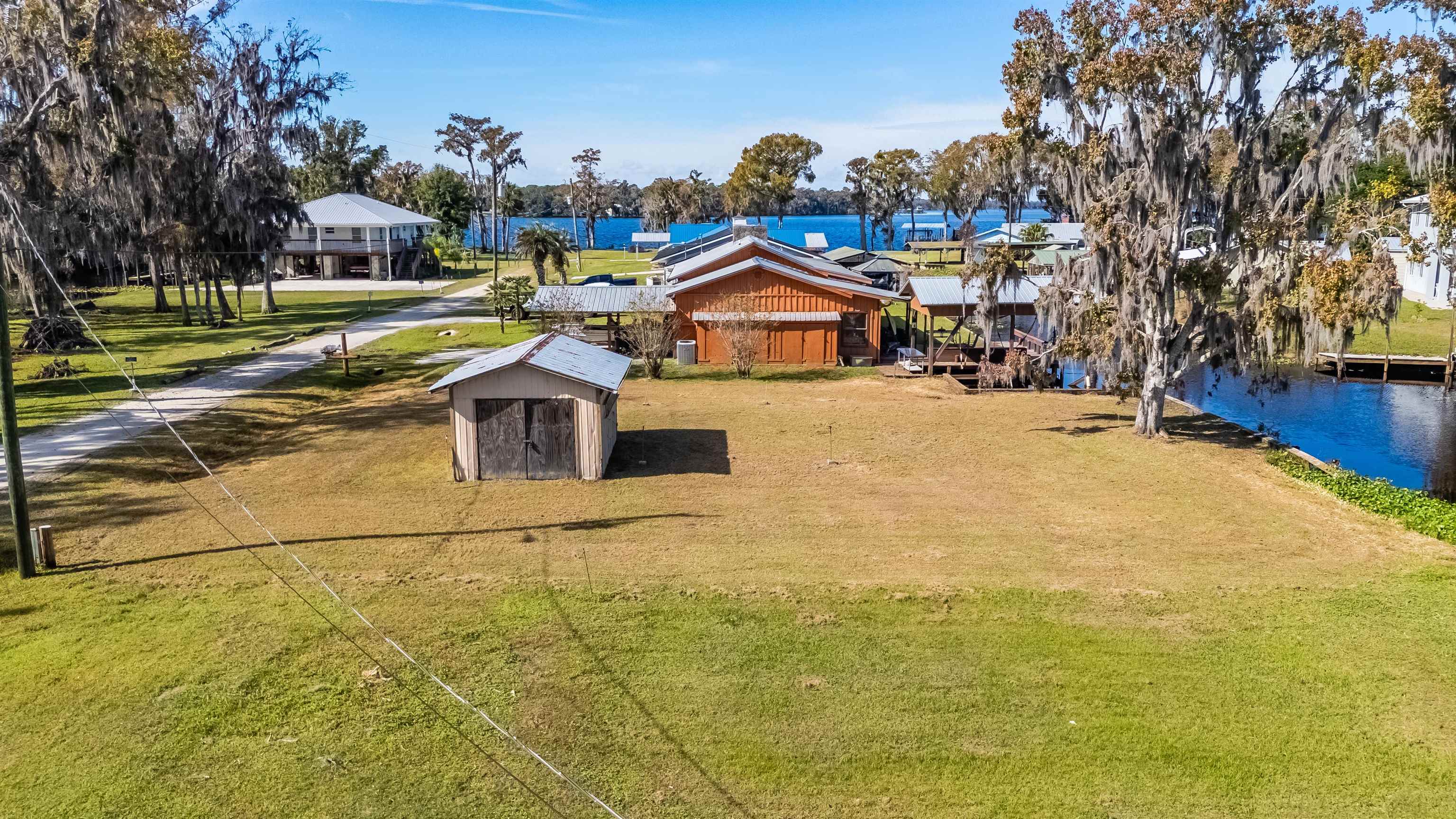 142 Hick's Avenue Crescent City, FL 32112 - Photo 9 of 16 a house view with swimming pool in front of it