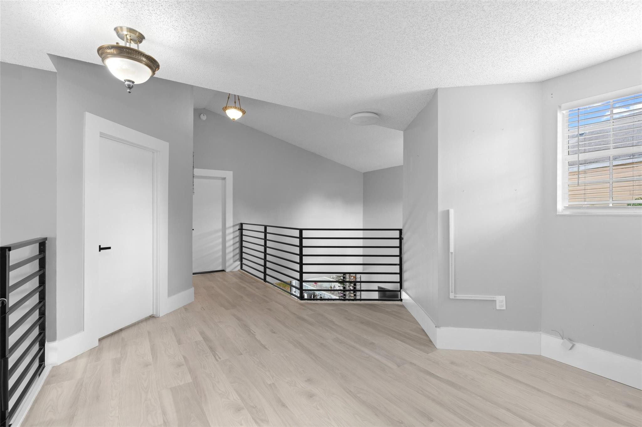 133 Southwest 159th Way Sunrise, FL 33326 - Photo 15 of 38 a view of empty room with wooden floor