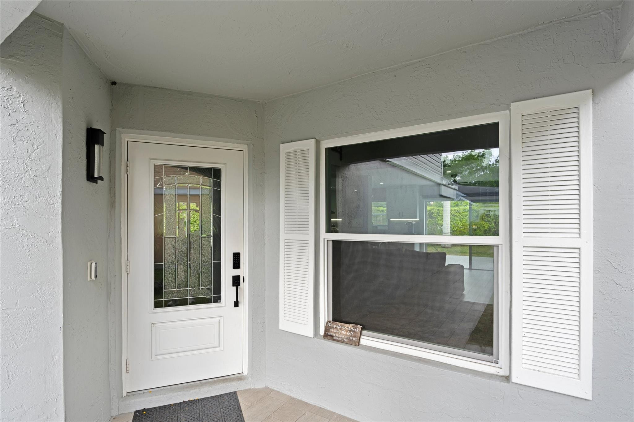 133 Southwest 159th Way Sunrise, FL 33326 - Photo 2 of 38 a view of outdoor space deck and window