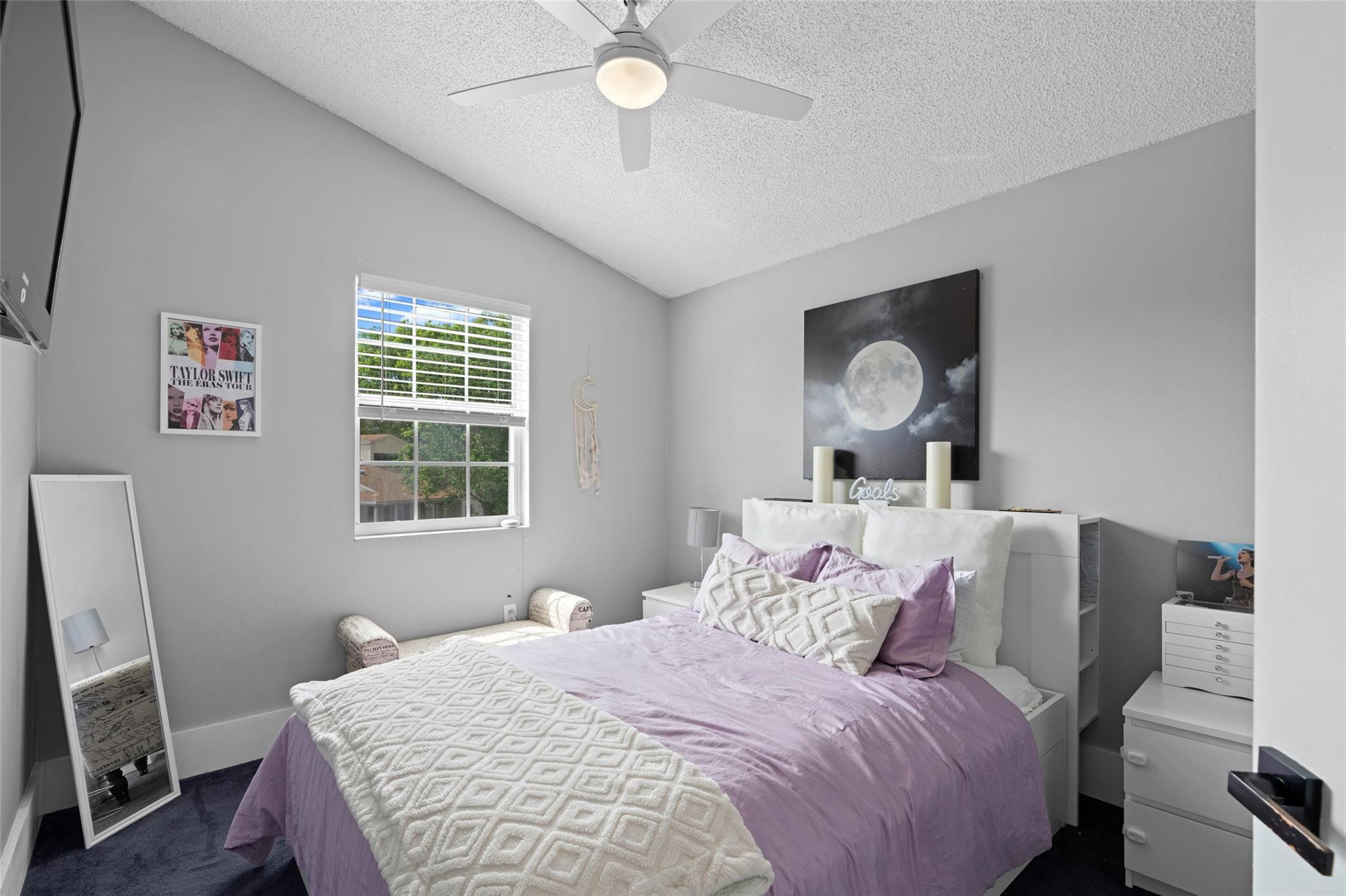 133 Southwest 159th Way Sunrise, FL 33326 - Photo 22 of 38 a bedroom with a bed and a window
