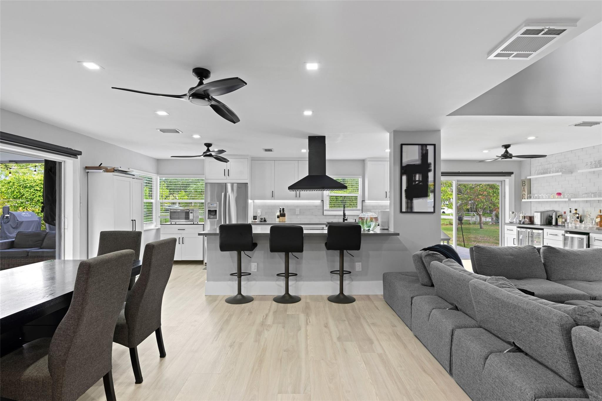 133 Southwest 159th Way Sunrise, FL 33326 - Photo 6 of 38 a living room with furniture and a large window