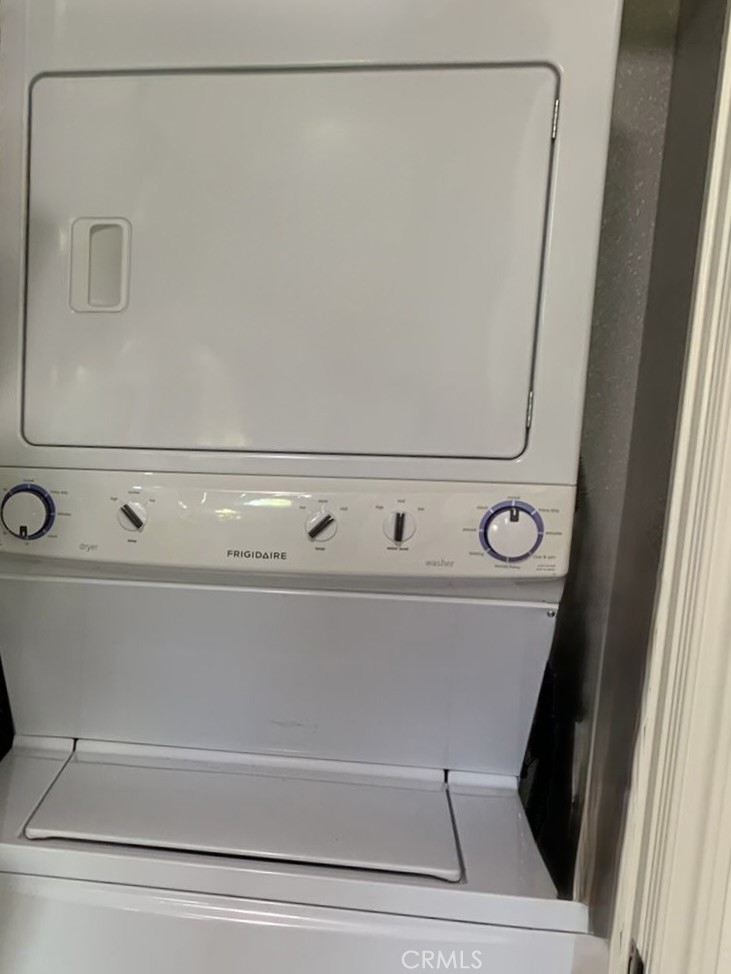 9293 Regents Road, Unit C303 La Jolla, CA 92037 - Photo 6 of 9 a close view of washer and dryer