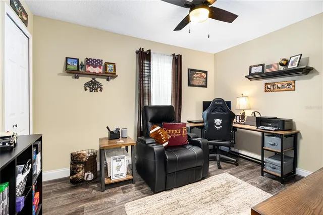 an aerial view of a house with a lake view