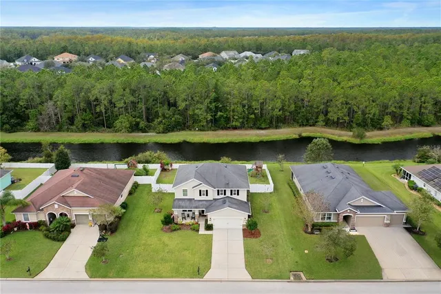 a view of a balcony with wooden fence and floor