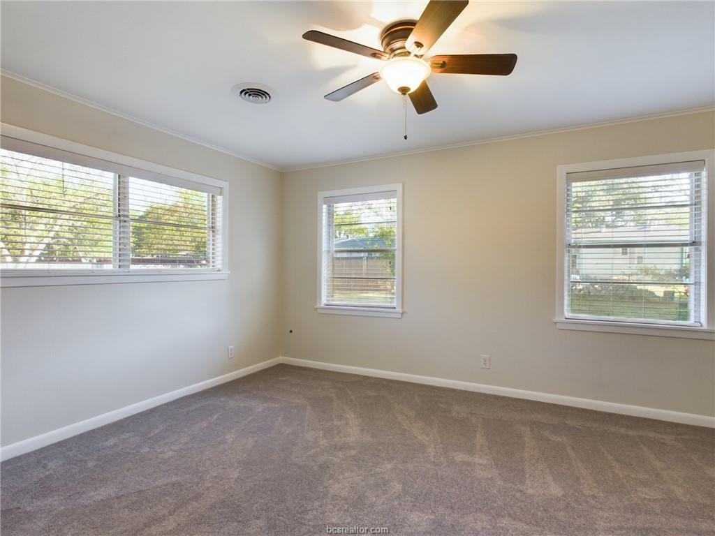 1504 East 29th Street Bryan, TX 77802 - Photo 12 of 19 a view of an empty room with a window