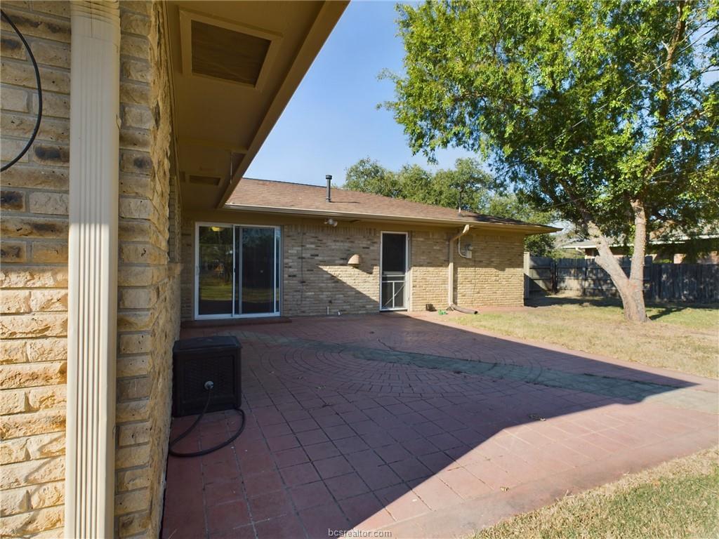 1504 East 29th Street Bryan, TX 77802 - Photo 16 of 19 a view of a house with a patio