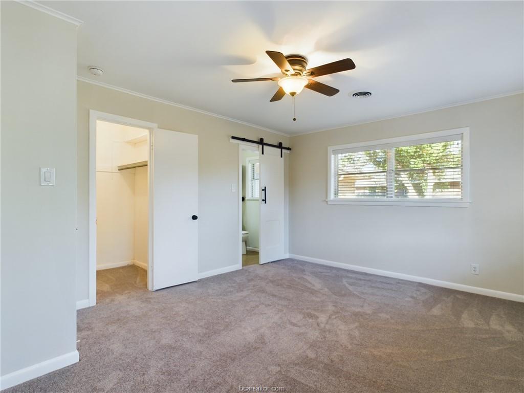 1504 East 29th Street Bryan, TX 77802 - Photo 9 of 19 a view of an empty room with a window