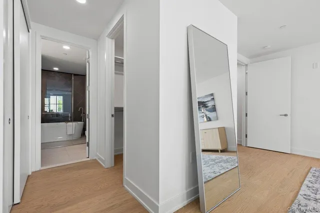 a view of livingroom with hardwood floor and hallway