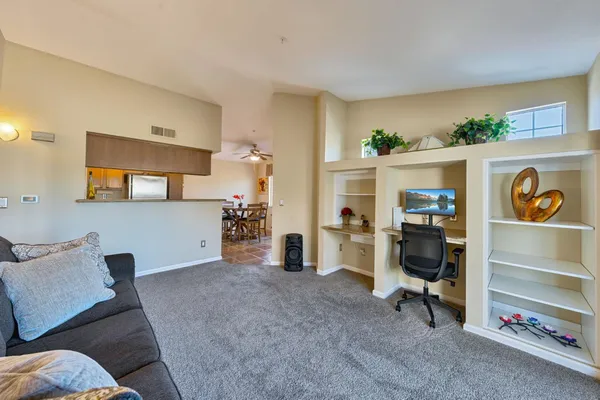 a view of a livingroom with furniture and a livingroom