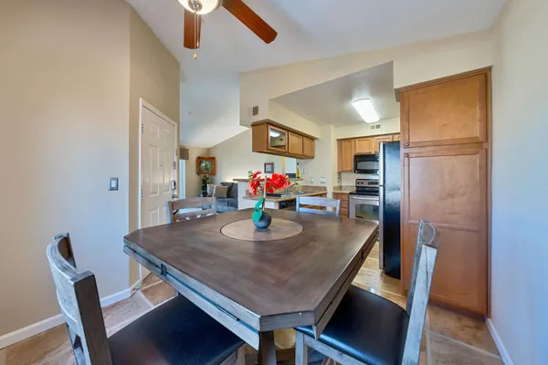 a view of a dining room with furniture
