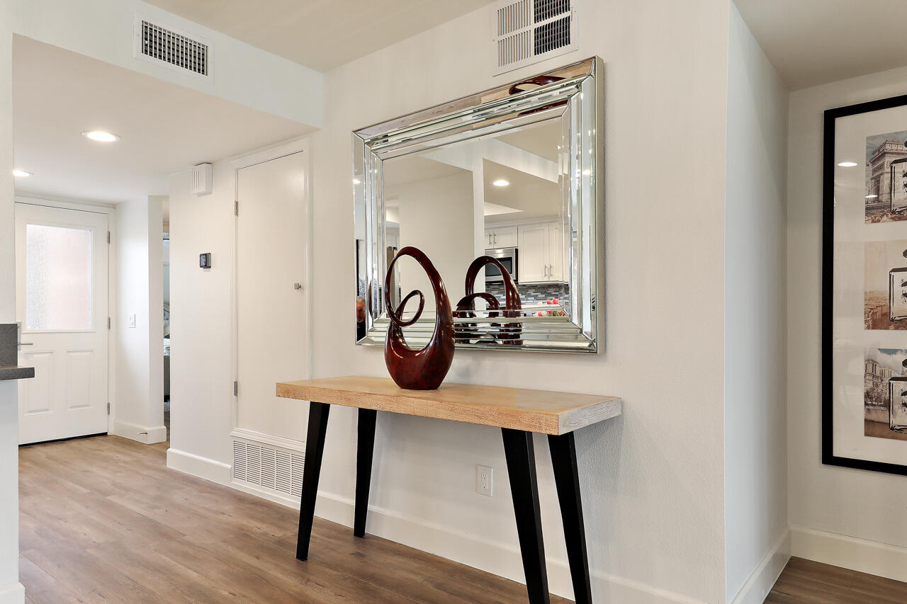36 Sunrise Drive Rancho Mirage, CA 92270 - Photo 8 of 39 a view of workspace with furniture and wooden floor
