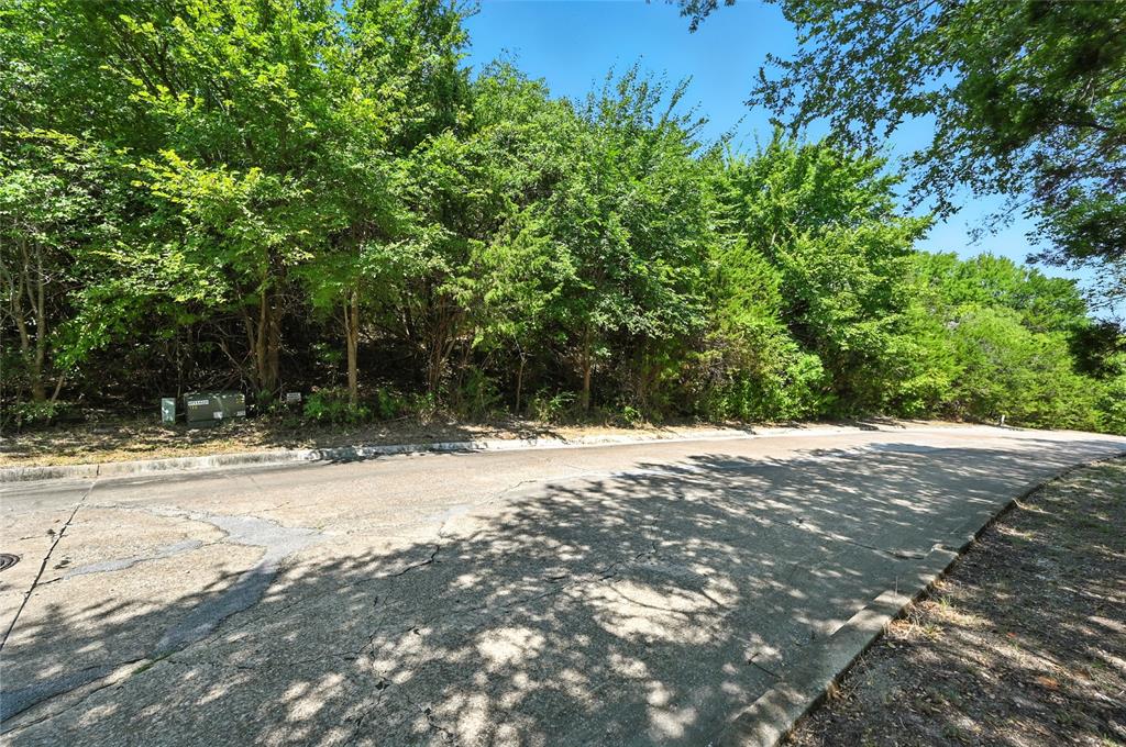 1917 Juniper Ridge Road Cedar Hill, TX 75104 - Photo 6 of 34 View of asphalt road featuring curbs