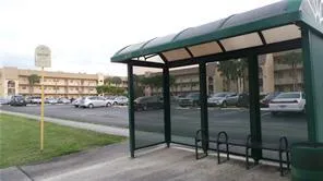 a patio with table and chairs