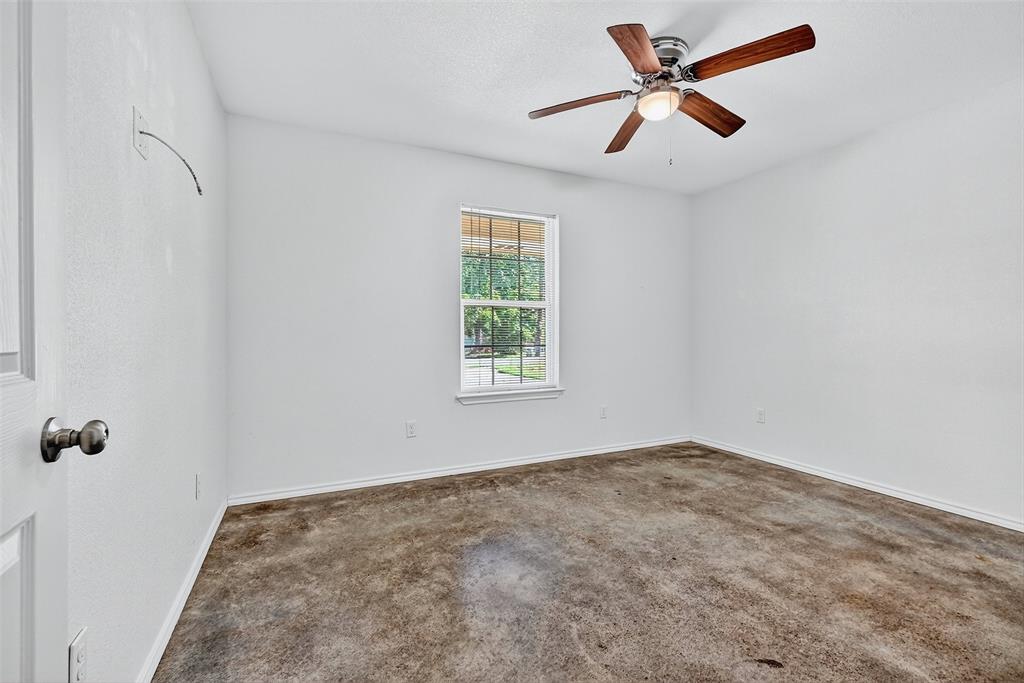 712 Seven Oaks Road, Unit 712 Bonham, TX 75418 - Photo 17 of 39 a view of a big room with carpet