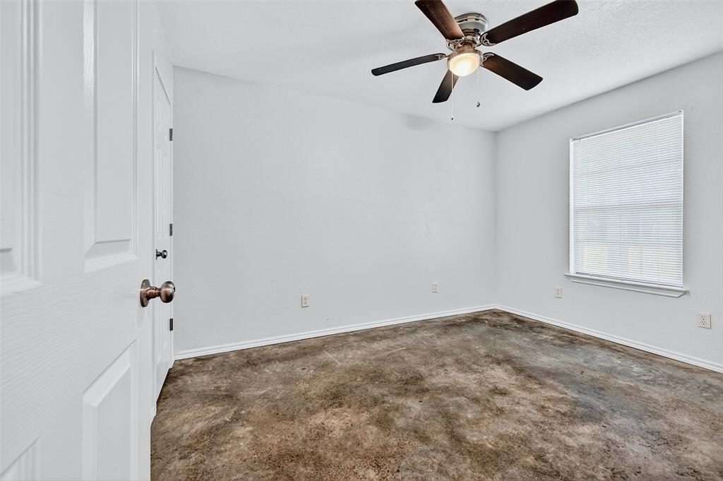 712 Seven Oaks Road, Unit 712 Bonham, TX 75418 - Photo 20 of 39 a view of a big room with carpet