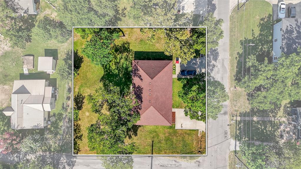 712 Seven Oaks Road, Unit 712 Bonham, TX 75418 - Photo 39 of 39 an aerial view of a house