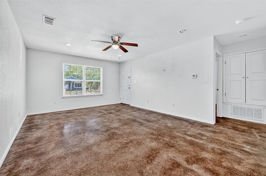 712 Seven Oaks Road, Unit 712 Bonham, TX 75418 - Photo 9 of 39 a view of an empty room with a window