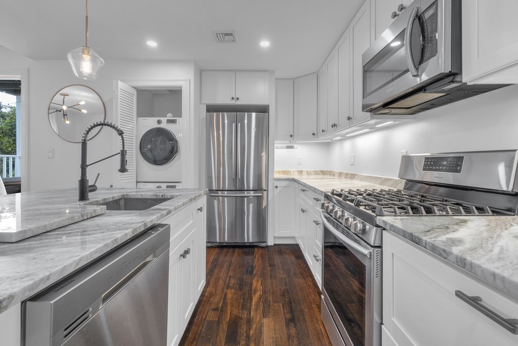 29 Walton Street, Unit 2 Boston, MA 02124 - Photo 1 of 21 a kitchen with a stove and a sink