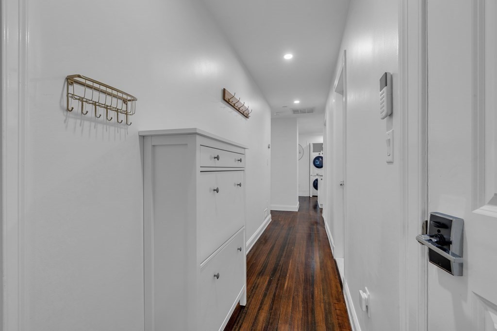 29 Walton Street, Unit 2 Boston, MA 02124 - Photo 12 of 21 a view of hallway with wooden floor