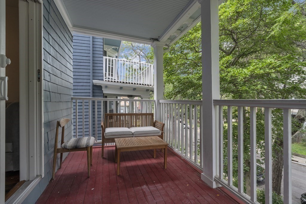 29 Walton Street, Unit 2 Boston, MA 02124 - Photo 16 of 21 a view of a balcony with furniture