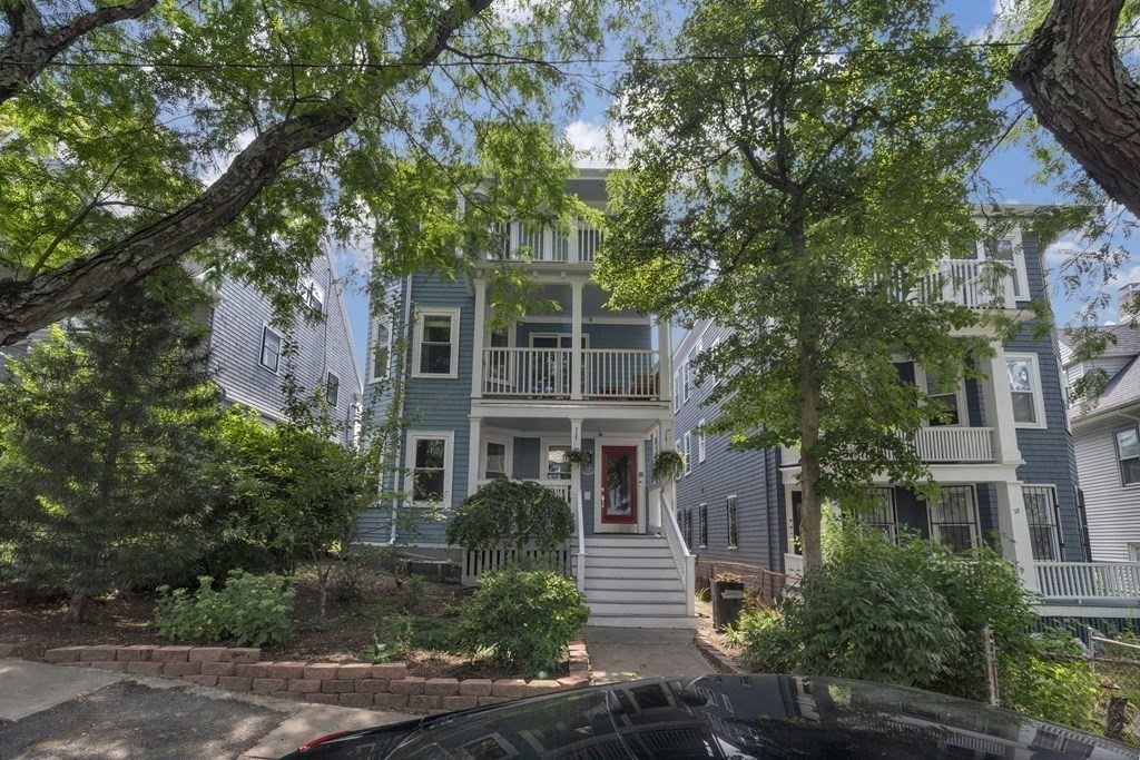 29 Walton Street, Unit 2 Boston, MA 02124 - Photo 17 of 21 a front view of a house with trees