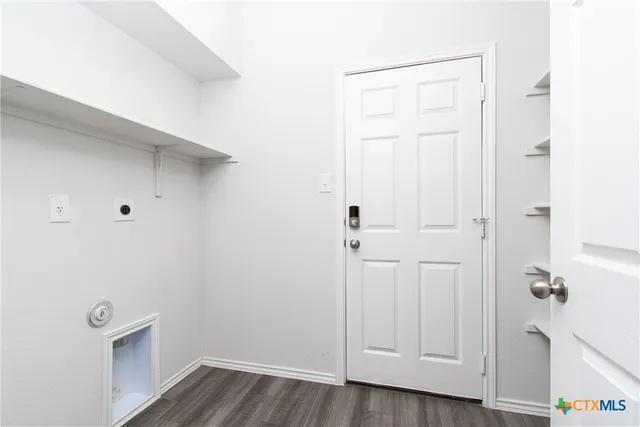 a view of an entryway with hallway