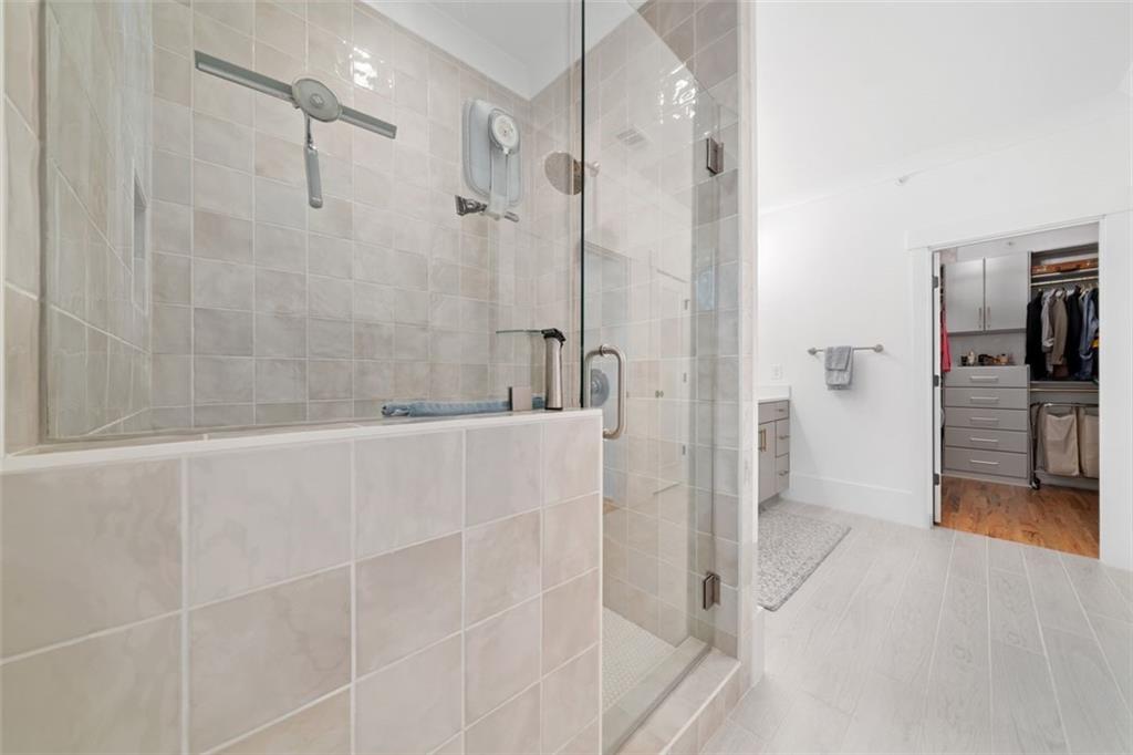 1045 Endeavour Court Marietta, GA 30064 - Photo 20 of 39 a bathroom with a shower and a sink