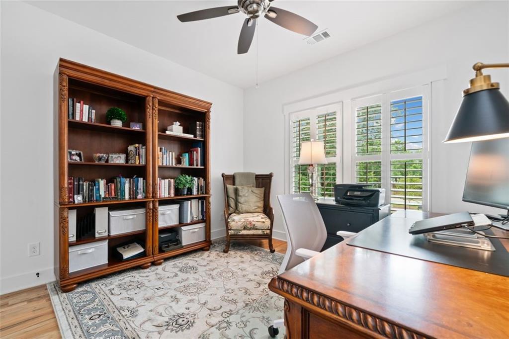 1045 Endeavour Court Marietta, GA 30064 - Photo 25 of 39 a view of a workspace with furniture and a window