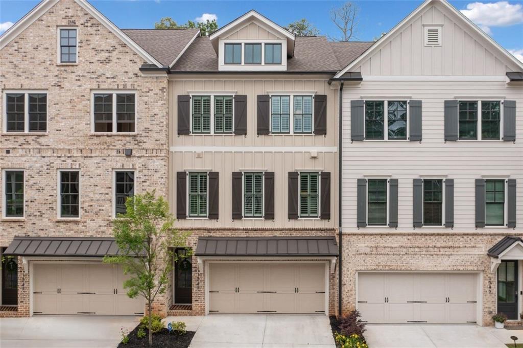 1045 Endeavour Court Marietta, GA 30064 - Photo 33 of 39 a front view of a house with a yard