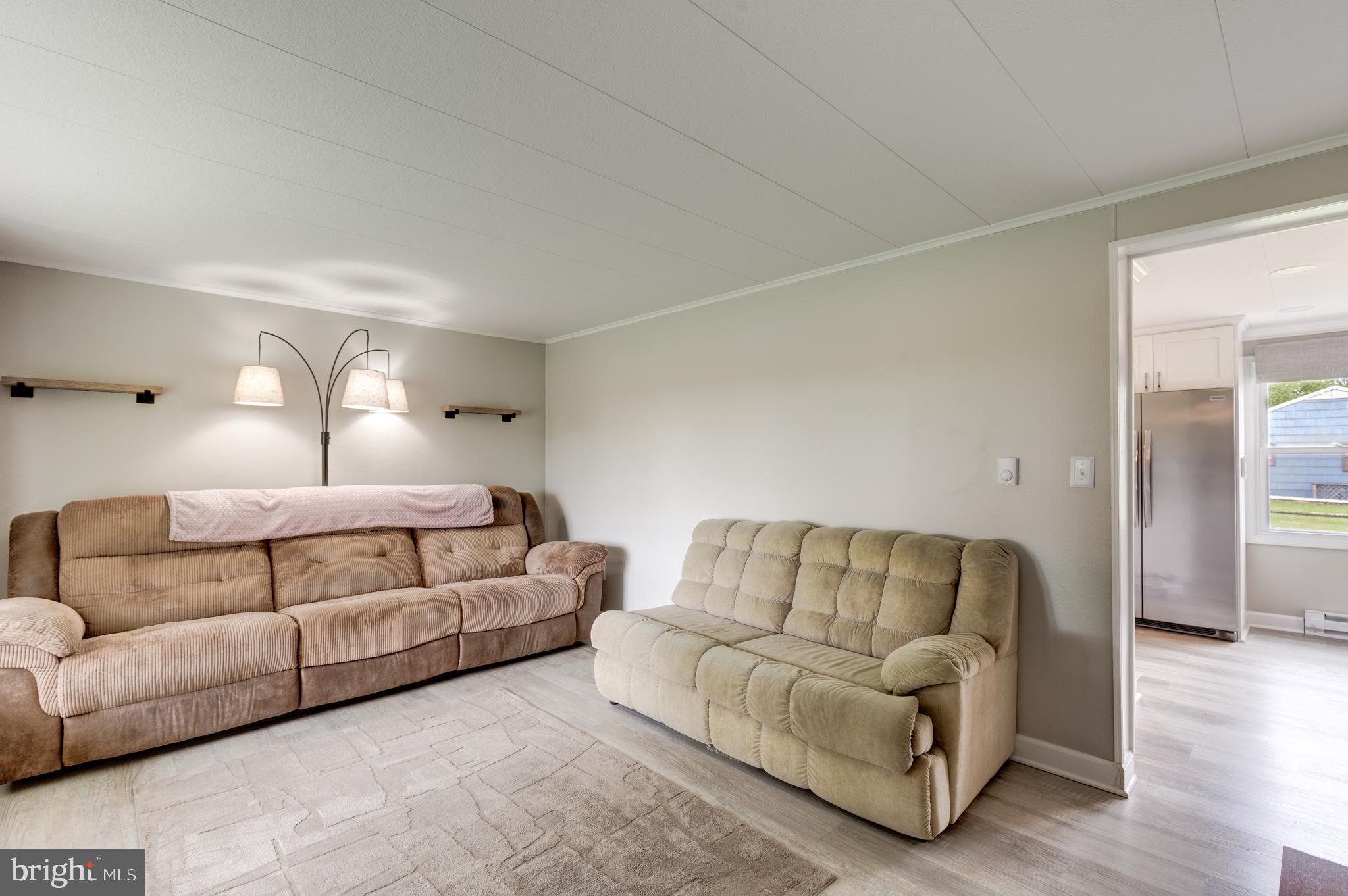 3801 Carrollton Road Upperco, MD 21155 - Photo 18 of 75 a living room with furniture and a couch