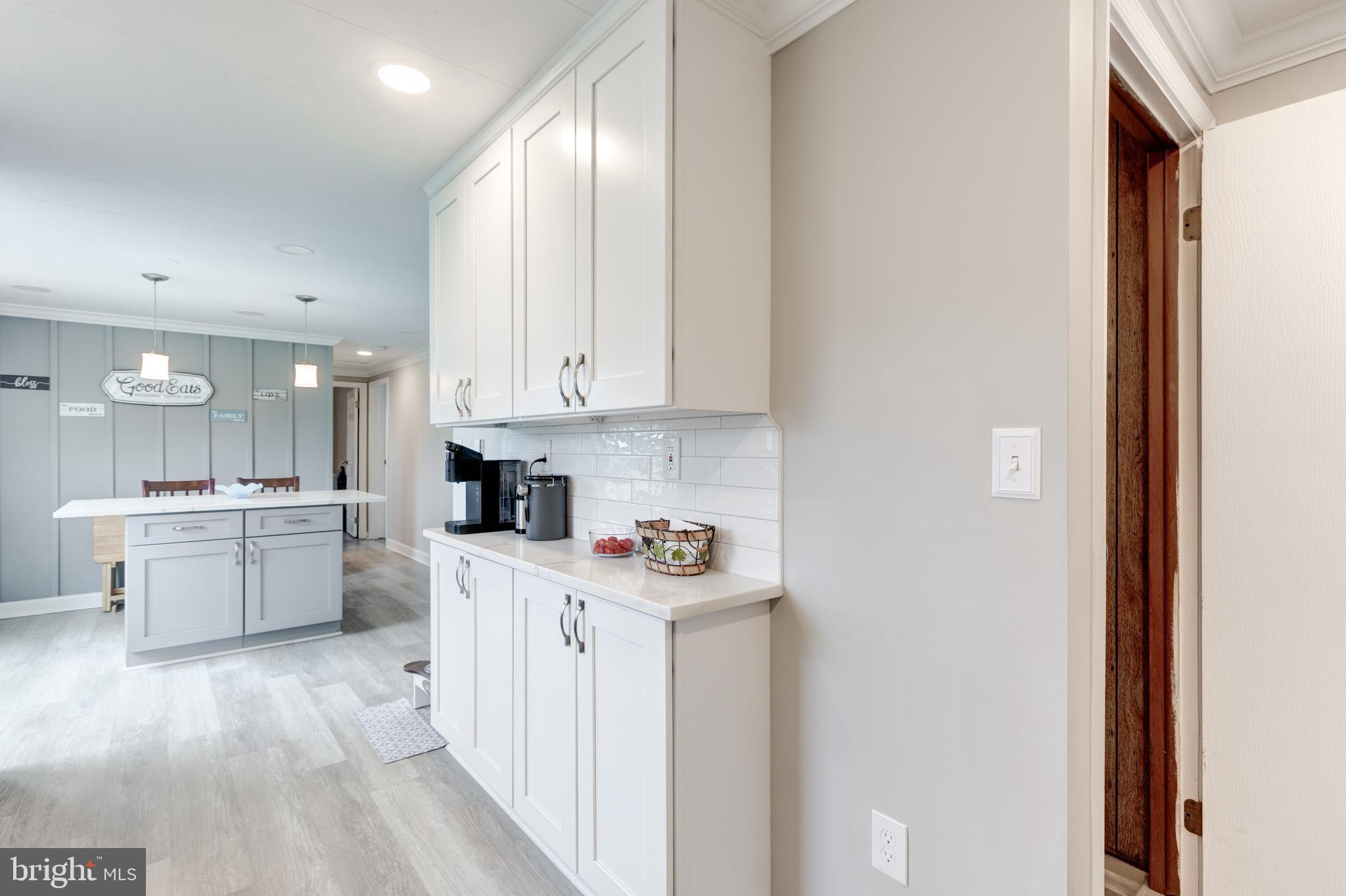 3801 Carrollton Road Upperco, MD 21155 - Photo 29 of 75 a kitchen with white cabinets and sink