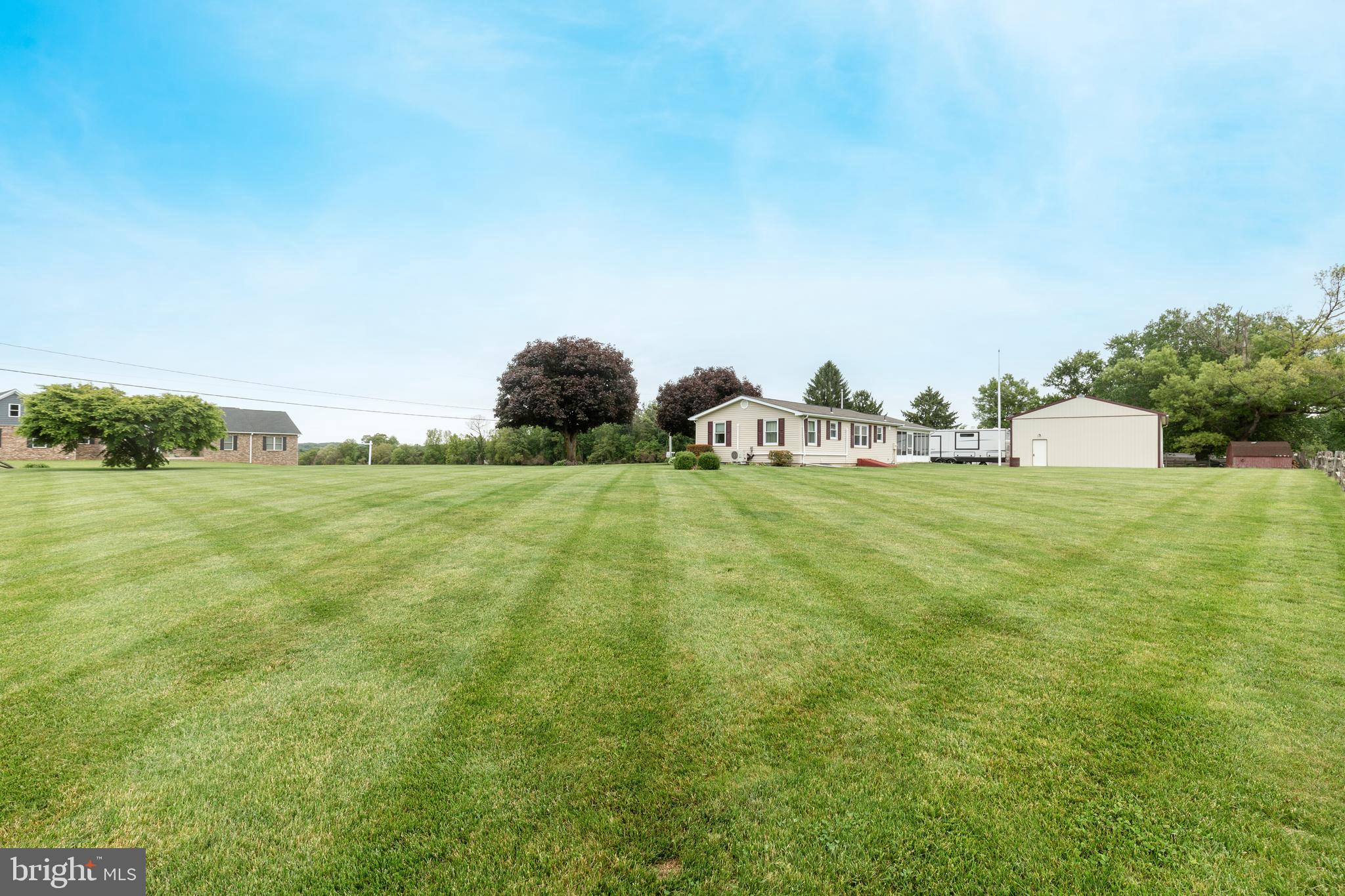 3801 Carrollton Road Upperco, MD 21155 - Photo 65 of 75 a view of a green field with some trees