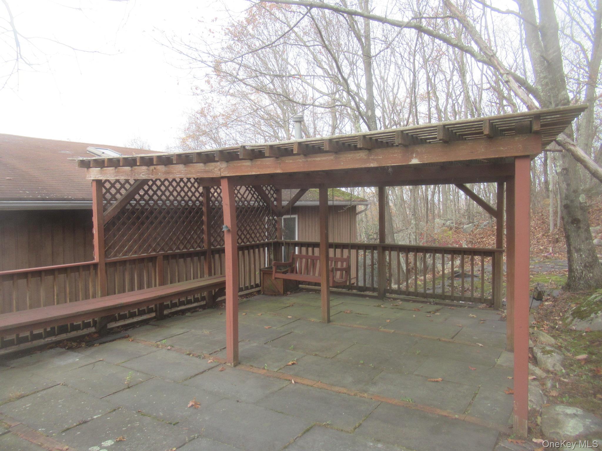 64 Hillside View Road Mahopac, NY 10541 - Photo 21 of 25 View of patio featuring an outbuilding