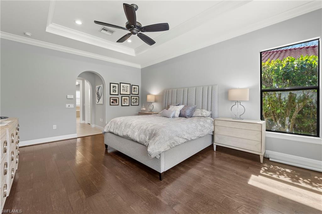 14517 Marsala Way Naples, FL 34109 - Photo 16 of 33 a bedroom with a large bed and a window