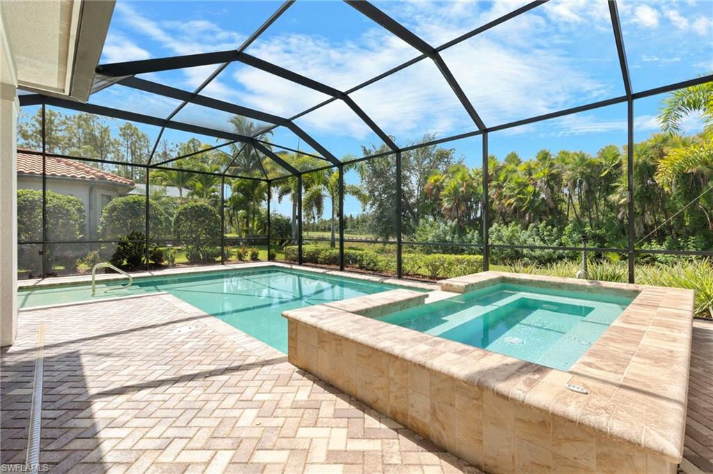 14517 Marsala Way Naples, FL 34109 - Photo 20 of 33 a view of swimming pool with a yard