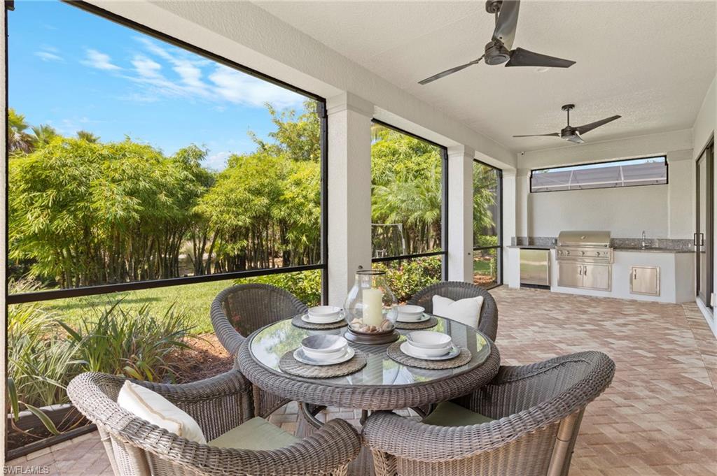 14517 Marsala Way Naples, FL 34109 - Photo 21 of 33 a view of a dining room with furniture window and outside view