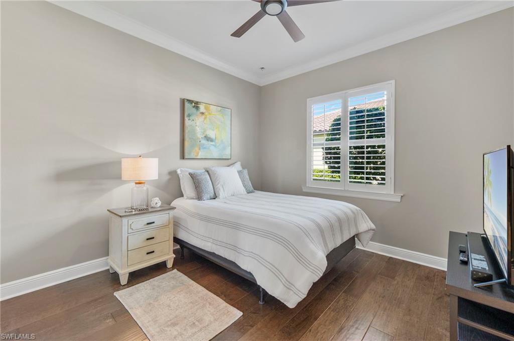 14517 Marsala Way Naples, FL 34109 - Photo 24 of 33 a bedroom with a bed and a window