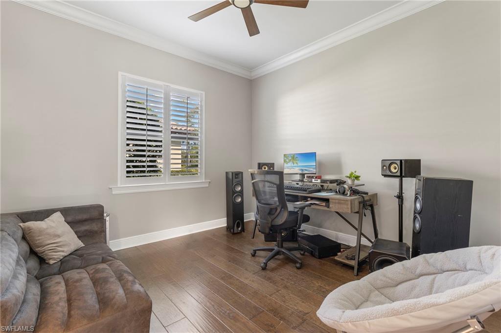 14517 Marsala Way Naples, FL 34109 - Photo 26 of 33 a view of a workspace with furniture and a window