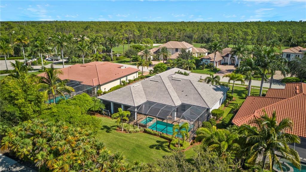 14517 Marsala Way Naples, FL 34109 - Photo 31 of 33 an aerial view of a house with garden space and outdoor seating