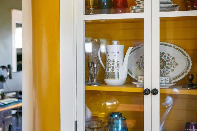 a view of a bathroom with a glass door