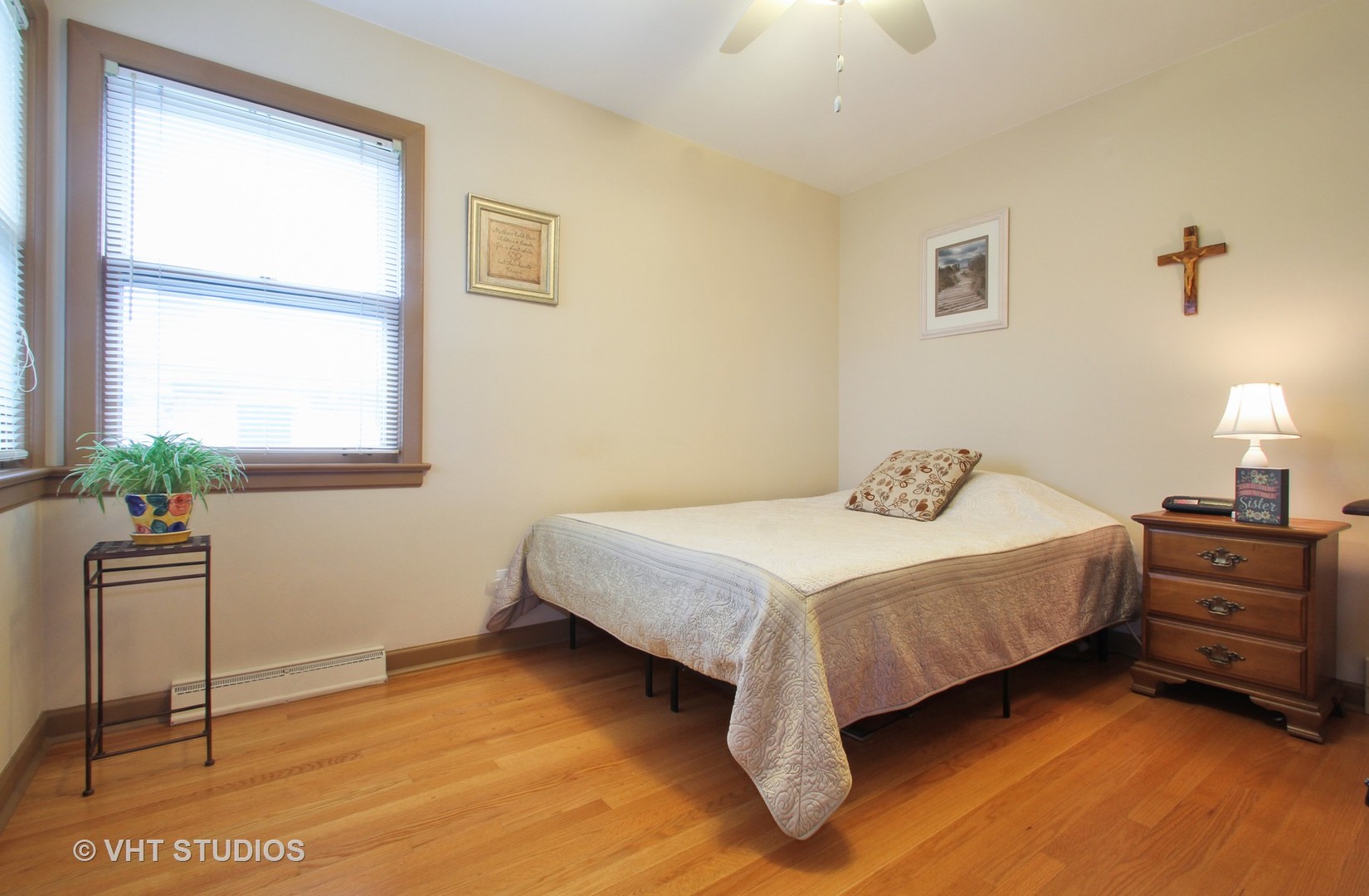 8019 Wisner Street Niles, IL 60714 - Photo 3 of 11 a spacious bedroom with a bed and a window