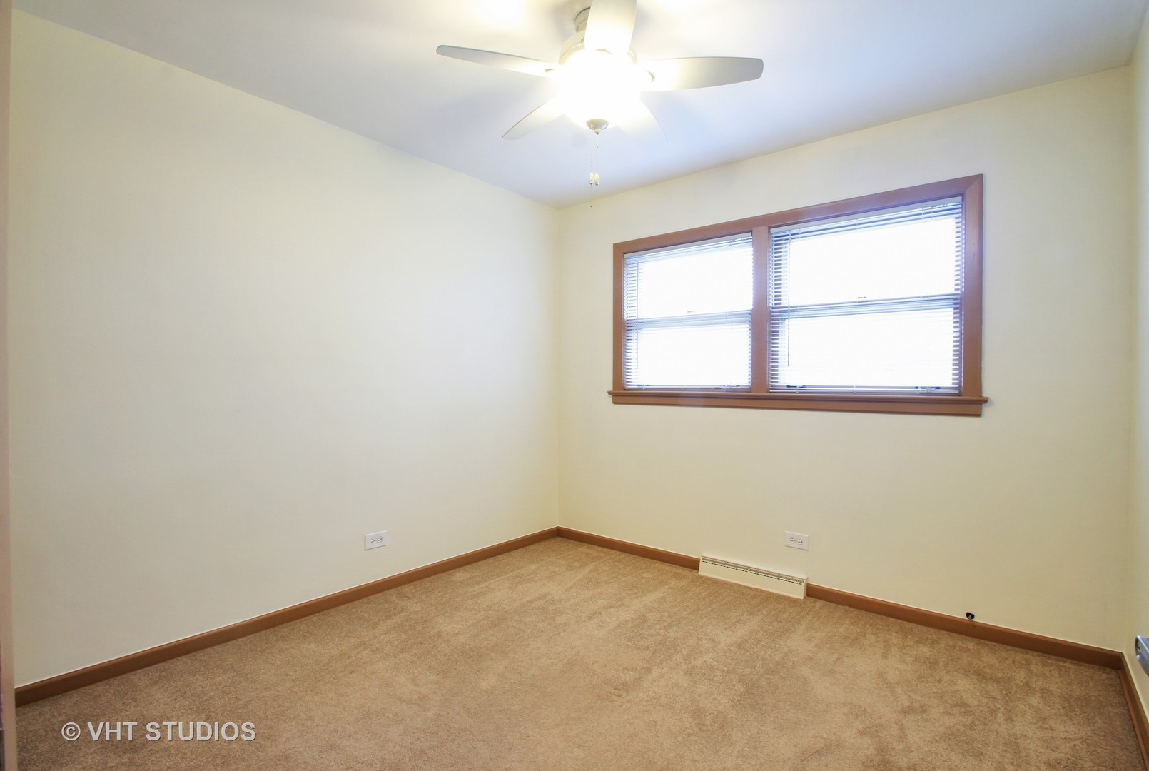 8019 Wisner Street Niles, IL 60714 - Photo 6 of 11 an empty room with a window