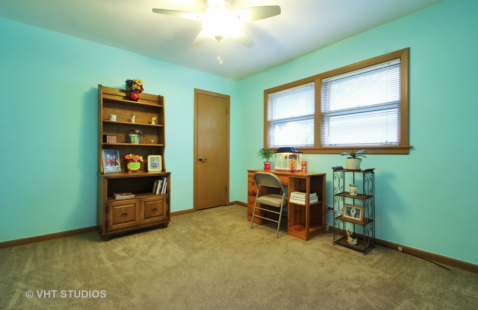 8019 Wisner Street Niles, IL 60714 - Photo 7 of 11 a view of a workspace with furniture and a window