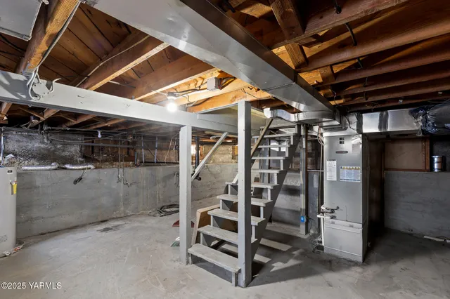 a view of an empty room with white walls