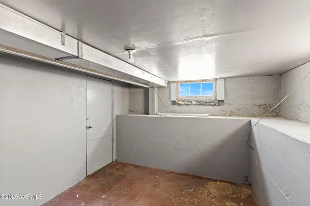 a view of storage and utility room with a sink