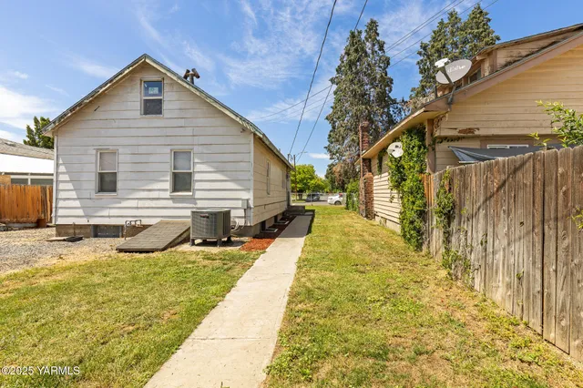 a view of swimming pool with a patio