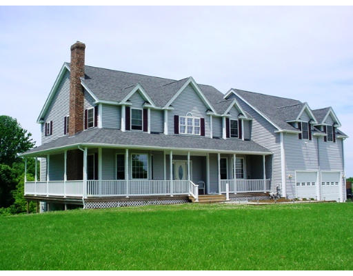 104 Putnam Hill Road Sutton, MA 01590 - Photo 1 of 1 a view of a house with a yard and plants
