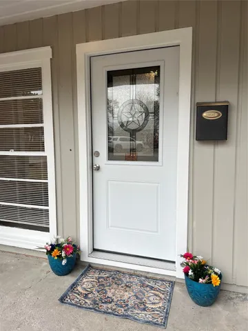 a room with wooden wall and painting on the wall